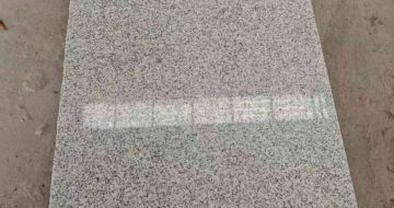 赤峰芝麻白光面毛板