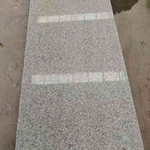 赤峰芝麻白光面毛板